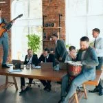 Musicians having fun while others are working