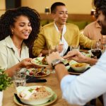 Group of friends enjoying food at the restaurant