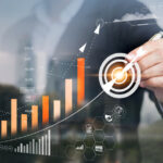 Businessman touching virtual screen Analyzing financial and investment data, planning strategies to increase sales profits