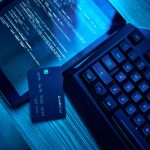 Information technology, hacking and credit card for cyber security crime in bank, phishing and software on digital tablet. Html script, screen and fintech of data fraud, password and coding on dark neon desk