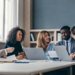 Master’s in Management (mim) students studying in library