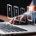 Entrepreneur using electronic devices hiring