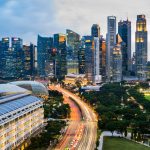 High Angle View Of Road Amidst Buildings In City Against Sky. Urban living in singapore