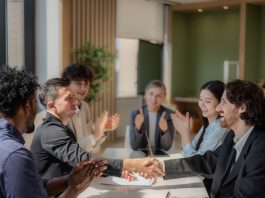Business people shaking hands after negotiation