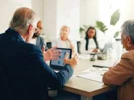 Superstar firms having a meeting in office for finance