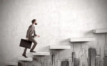 CEO climbing a concrete stair. CEO growth concept