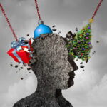 human head shape made of concrete being pounded by christmas symbols