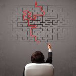 businessman looking at a maze