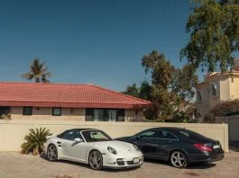 luxury cars parked near the house in the elite district of the city