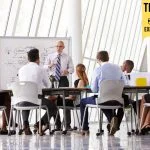 Senior Businessman Leading Meeting about organizational agility At Boardroom Table