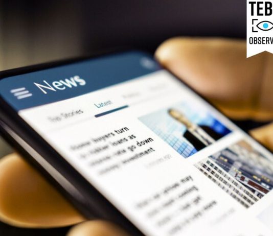 Person checking article online. Editorial Credibility concept