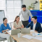 Colleagues having a meeting in office boardroom asian young businessman lead his team to discuss their projects Businesswoman and businessman leading a meeting in office.Business incubator concept